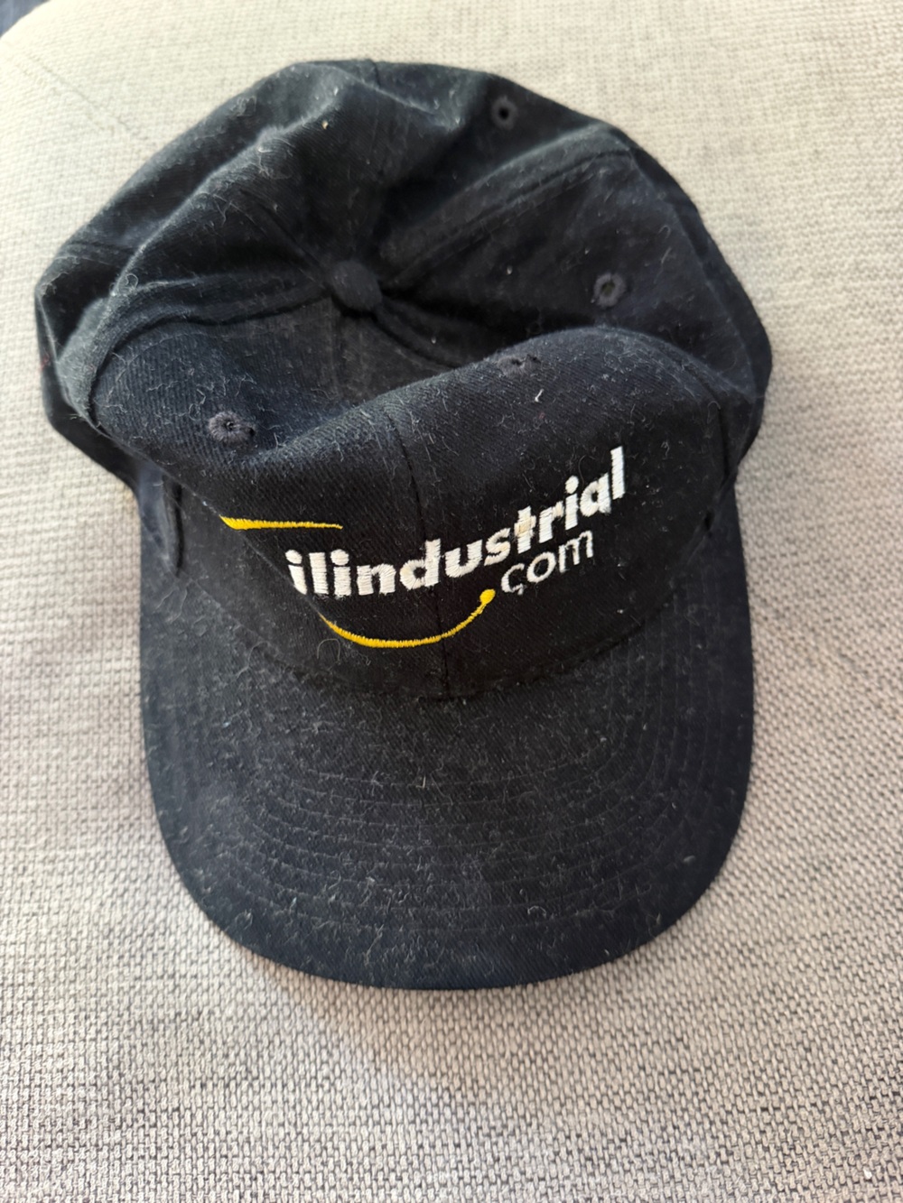 Industrial.com Hat Tag with Blue and Orange Print